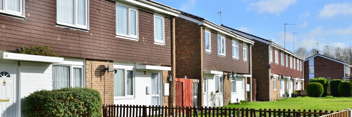 HSR Law Solicitors - Right to Buy Scheme - Picture of a row of council houses UK - Banner Image