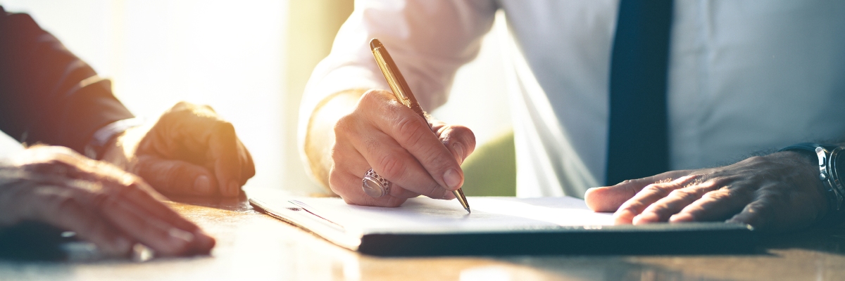 HSR Law - Grant of Probate Solicitors - Picture of a professional signing a document - Banner